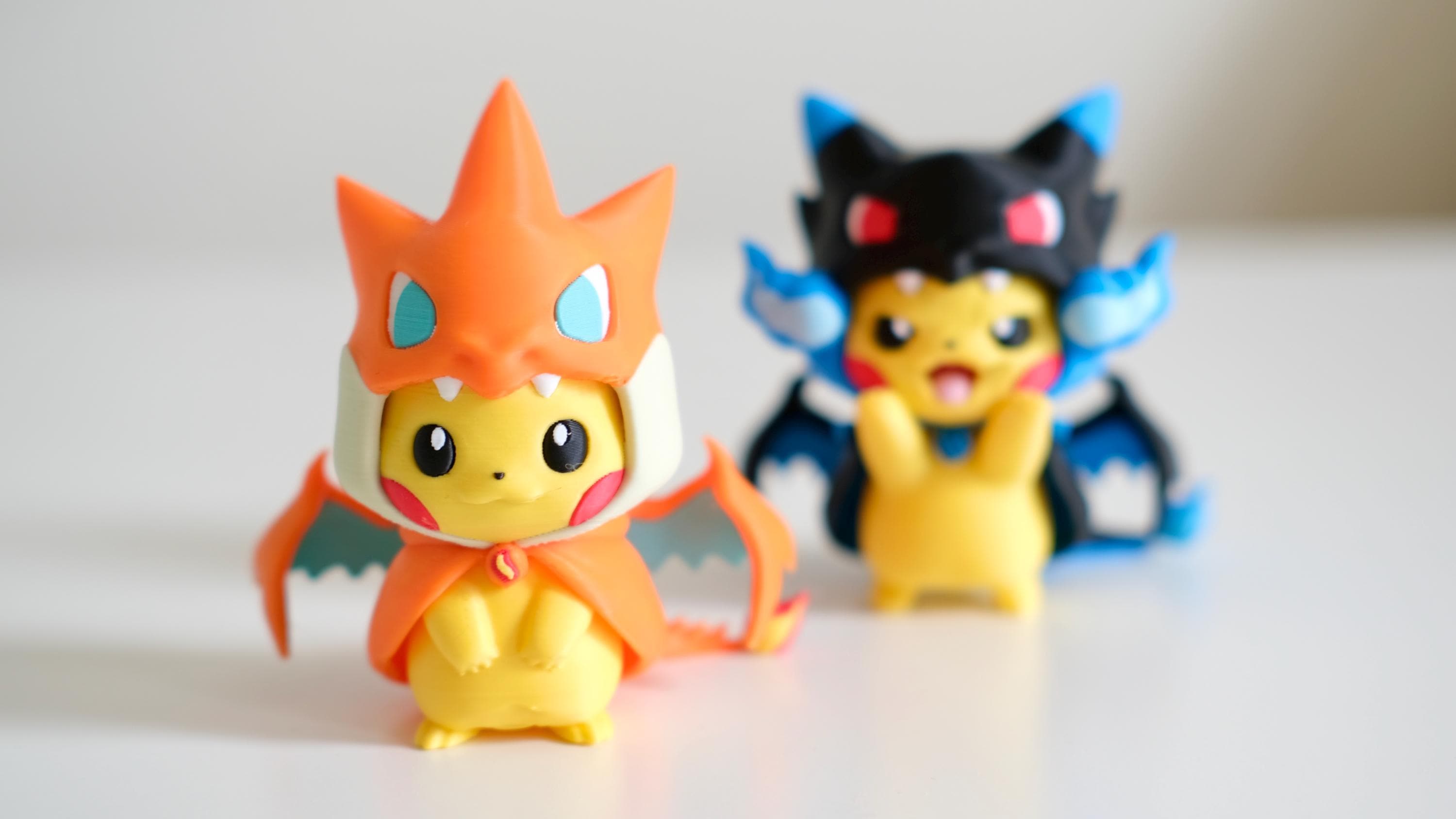 Poncho Pika Figure: Rayquaza, Charizard, Magikarp, Gengar