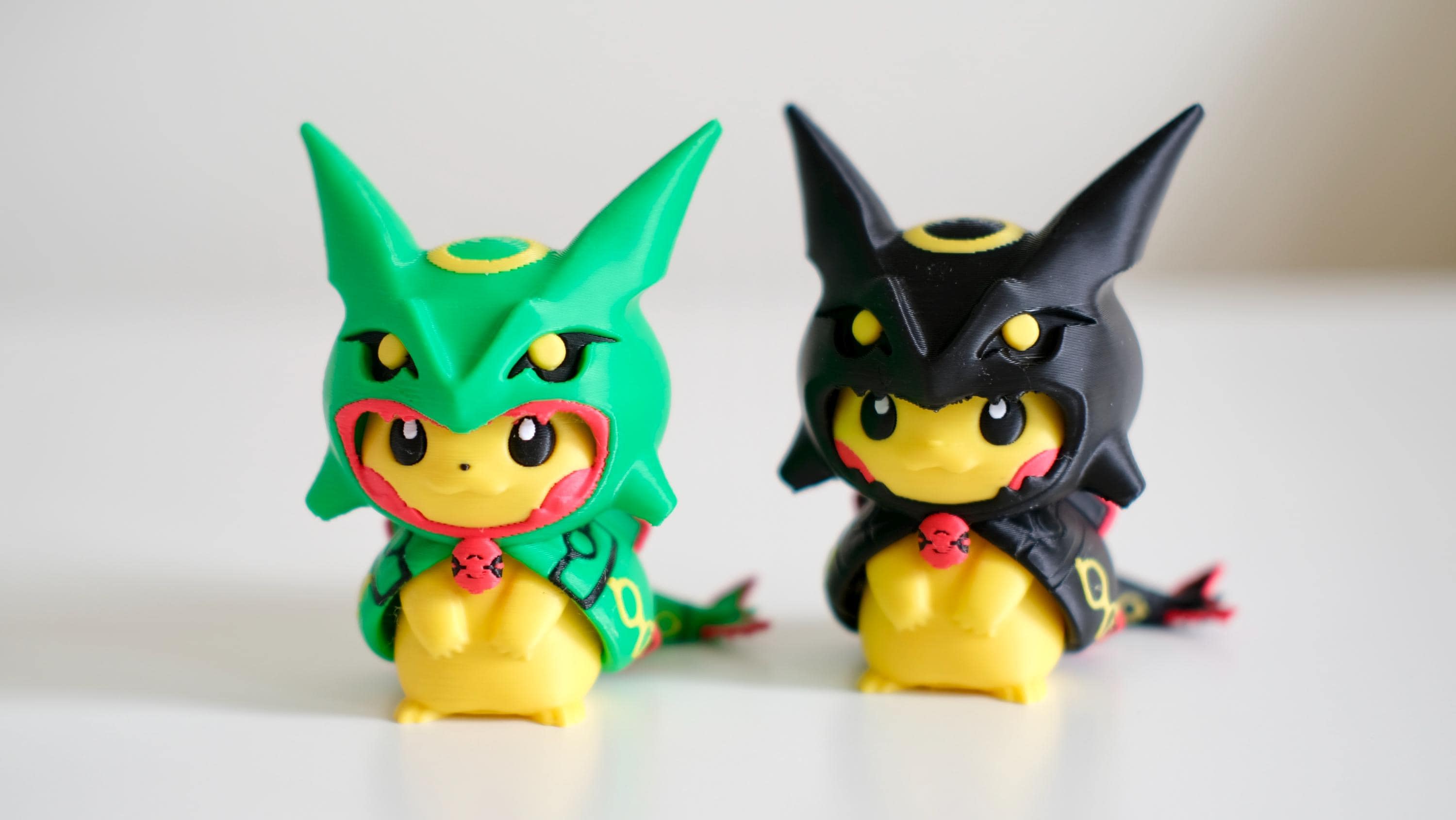 Poncho Pika Figure: Rayquaza, Charizard, Magikarp, Gengar