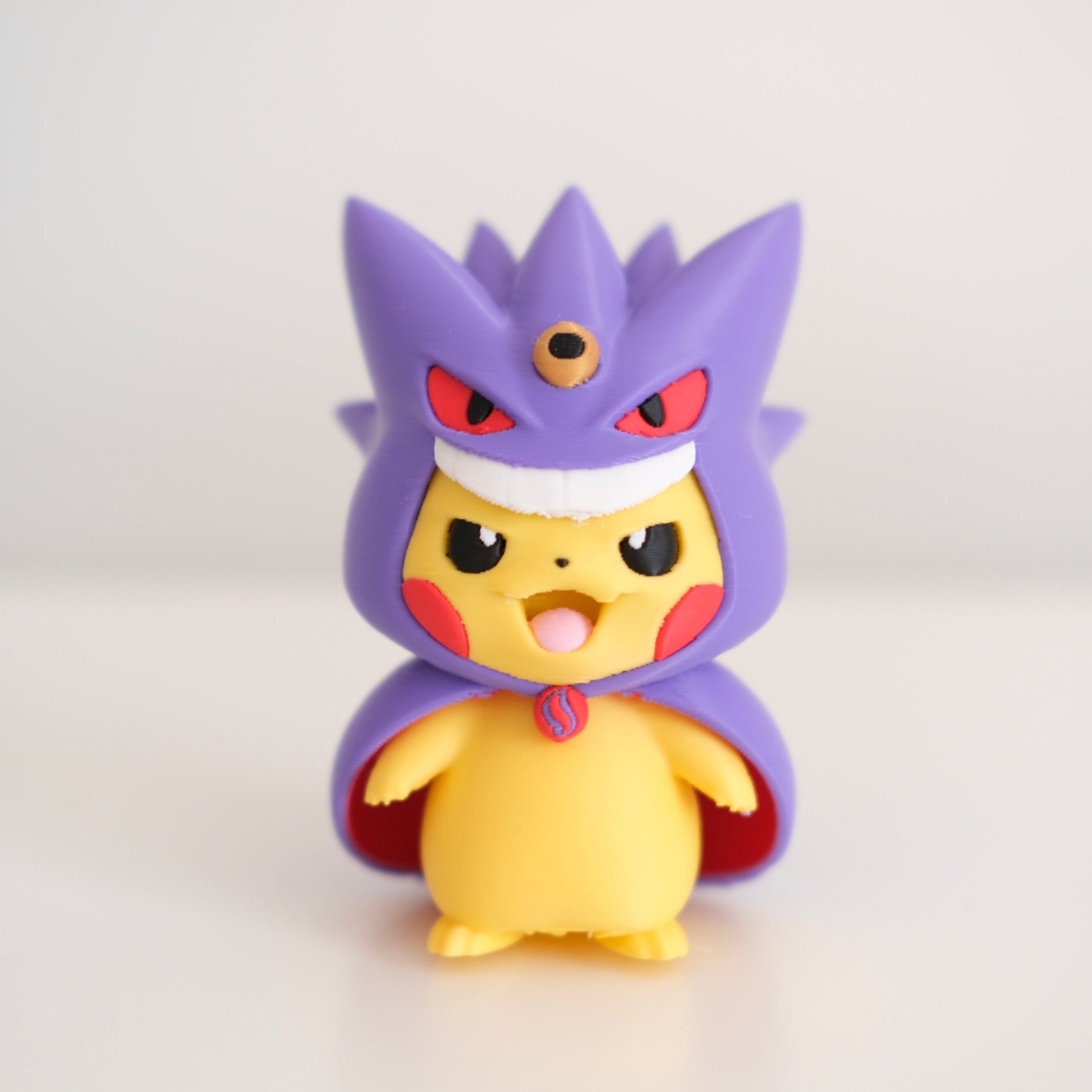 Poncho Pika Figure: Rayquaza, Charizard, Magikarp, Gengar