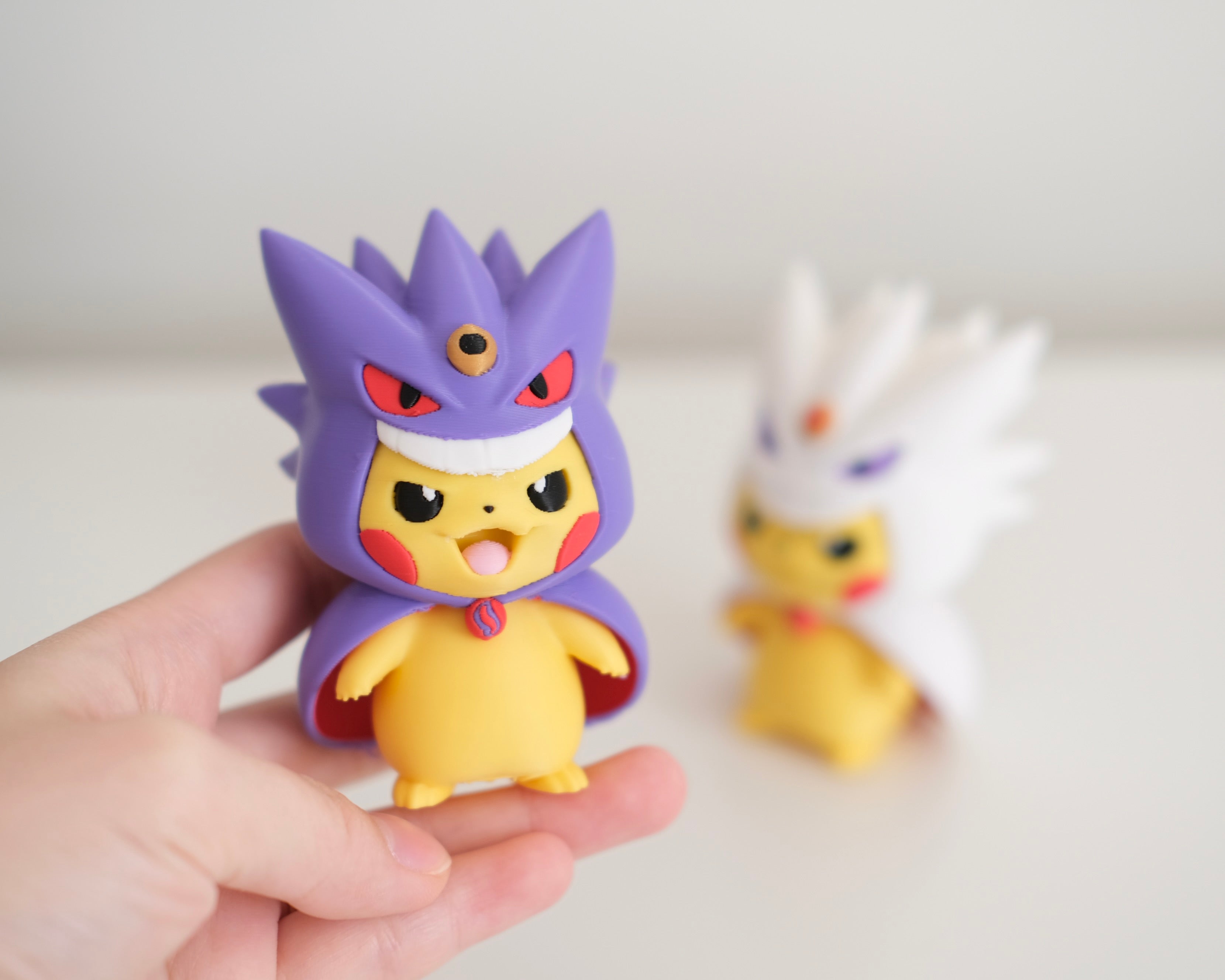Poncho Pika Figure: Rayquaza, Charizard, Magikarp, Gengar